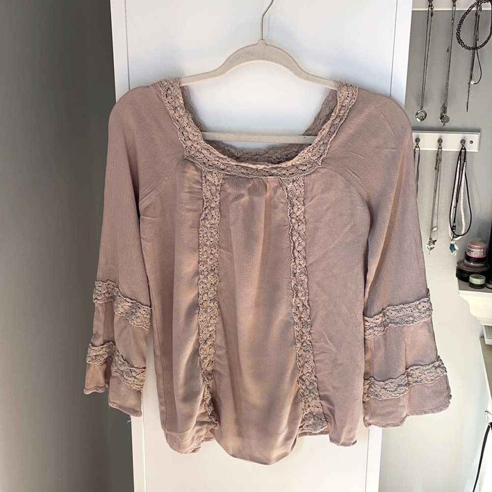 Light brown long sleeved ruffle blouse from altard state. Size small